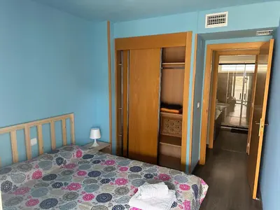 Cama o camas de una habitación en Piso familiar en El Toyo