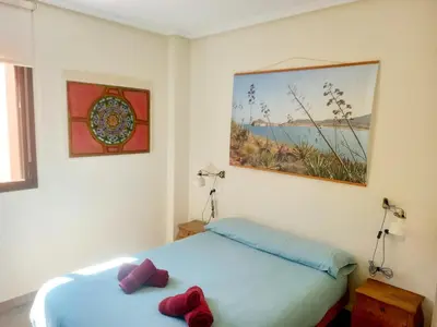 Cama o camas de una habitación en Apartamento El Zapillo II