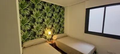 Cama o camas de una habitación en Apartamento El Zapillo II