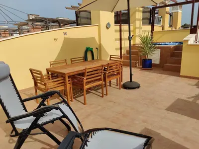 Un balcón o terraza de Casa del Sol con Jacuzzi - Vera Playa Laguna Beach