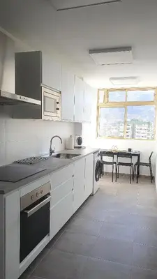Una cocina o zona de cocina en PALM TOWER APARTMENT