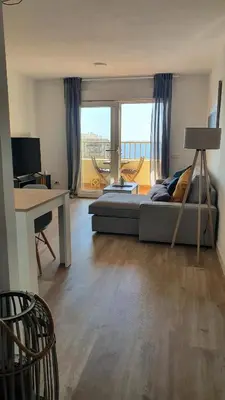 Una televisión o centro de entretenimiento en PALM TOWER APARTMENT