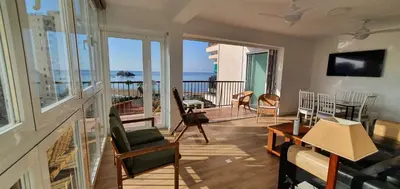 Una televisión o centro de entretenimiento en Balcón Playa Delicias