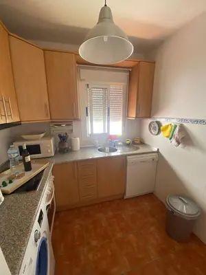 Una cocina o zona de cocina en Duplex con terraza en Agua Amarga
