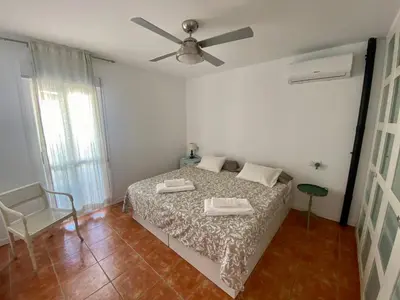 Cama o camas de una habitación en Duplex con terraza en Agua Amarga