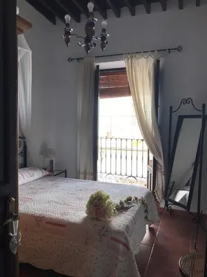 Cama o camas de una habitación en La Posada De Carmen