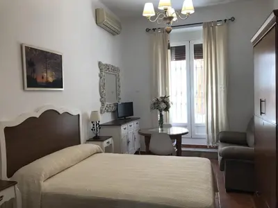 Cama o camas de una habitación en La Posada De Carmen