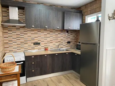 Una cocina o zona de cocina en Apartamento a pie de playa