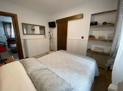 Cama o camas de una habitación en Apartamento a pie de playa