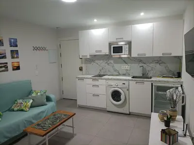 Una cocina o zona de cocina en Paradise of Dreams Apartamentos - MAREA APARTAMENTO