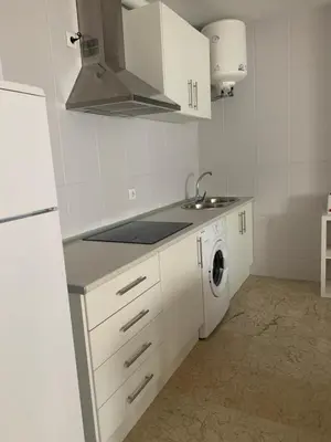 Una cocina o zona de cocina en ESTUDIO SEGUNDA LÍNEA DE PLAYA