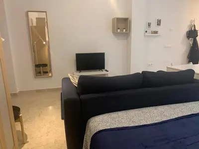 Una televisión o centro de entretenimiento en ESTUDIO SEGUNDA LÍNEA DE PLAYA
