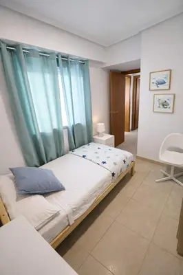 Cama o camas de una habitación en Brisas de Vera Ático Solárium con Vistas al Mar Parking Gratis