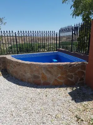 Piscina en o cerca de Casa Cueva Maite
