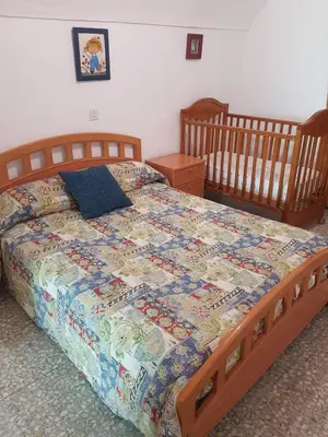 Cama o camas de una habitación en Casa Cueva Maite