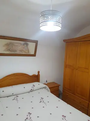Cama o camas de una habitación en Casa Cueva Maite