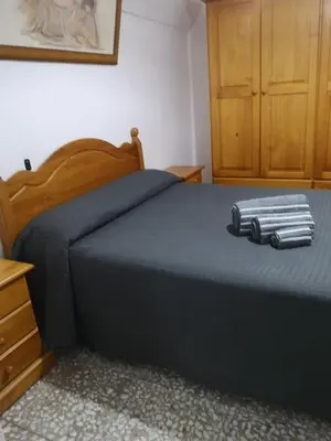 Cama o camas de una habitación en Casa Cueva Maite