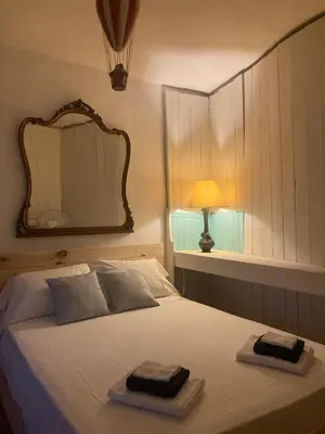 Cama o camas de una habitación en Cortijo de la Fuente con vistas impresionantes, piscina privada y playas a 20 minutos