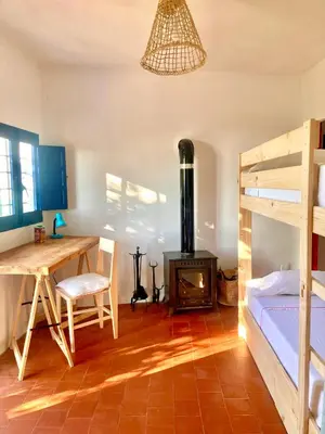 Cama o camas de una habitación en Cortijo de la Fuente con vistas impresionantes, piscina privada y playas a 20 minutos