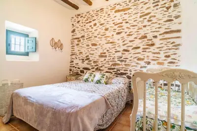 Cama o camas de una habitación en Paraje la Suerte Cortijo la Suerte