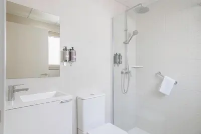 Un baño de Apartamentos Turísticos Best Indalo