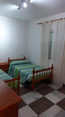 Cama o camas de una habitación en Chalet Terreros Playa