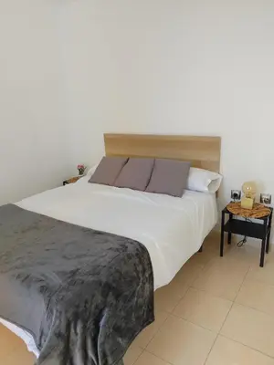 Cama o camas de una habitación en Ático con vistas al mar