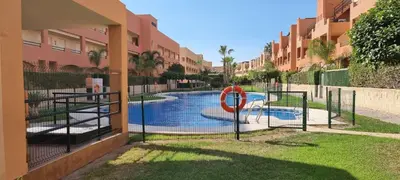 Piscina en o cerca de Homes of Spain, Apartamentos Paraiso Vera Playa, Ed Tahiti, Atico B de 2 dormitorios con piscina privada en solárium y barbacoa, pie de playa