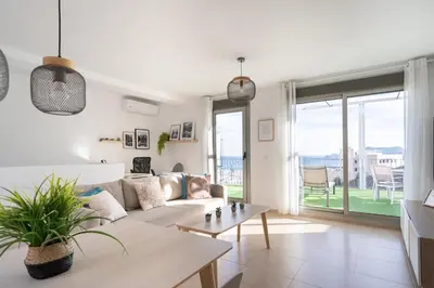 Zona de estar de Apartamento Cervantes con terraza y vistas al mar