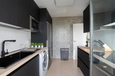Una cocina o zona de cocina en Apartamento Cervantes con terraza y vistas al mar