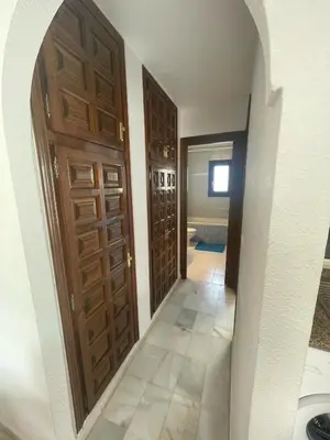 Cama o camas de una habitación en La Casa de Flores
