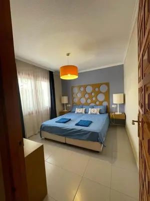 Cama o camas de una habitación en La Casita Azul Bajo