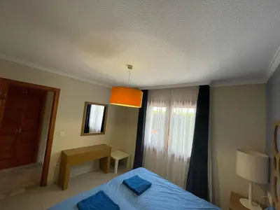 Cama o camas de una habitación en La Casita Azul Bajo