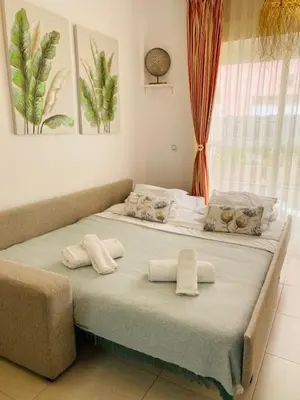 Cama o camas de una habitación en Apartamento en Vera Playa Laguna Beach