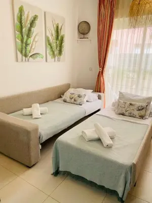 Cama o camas de una habitación en Apartamento en Vera Playa Laguna Beach