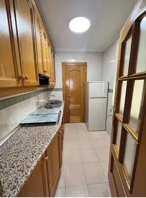Una cocina o zona de cocina en PISO Guadix MB
