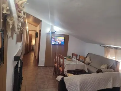 Una televisión o centro de entretenimiento en Casa de la Luz