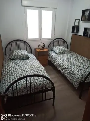 Cama o camas de una habitación en Appartement 120 mètres de la plage