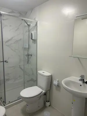 Un baño de Apartamentos MILANO