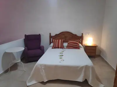 Cama o camas de una habitación en Casa Teatro Raices