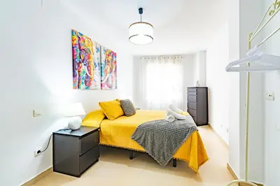 Cama o camas de una habitación en Avenida Principal junto a la Playa - by Aloha Palma