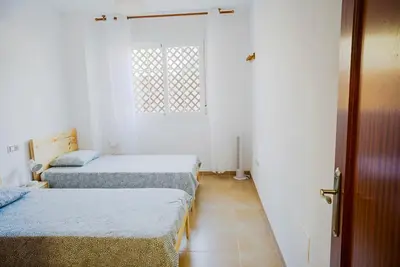 Cama o camas de una habitación en Piscina playa y relax en familia