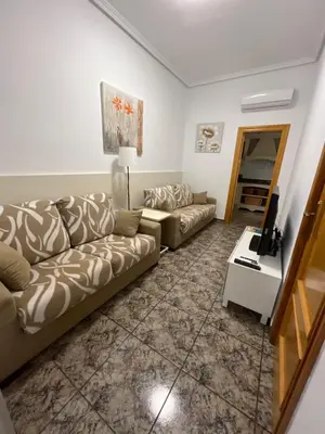 Zona de estar de Bonito apartamento cerca de la playa