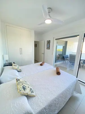 Cama o camas de una habitación en Villa Hélice - Apartamento con piscina, terraza y pádel en Cabo de Gata