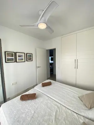 Cama o camas de una habitación en Villa Hélice - Apartamento con piscina, terraza y pádel en Cabo de Gata