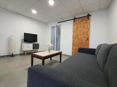 Una televisión o centro de entretenimiento en Casa en el Centro con vistas - by Aloha Palma