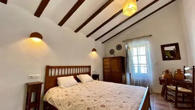 Cama o camas de una habitación en Cortijo Leontino