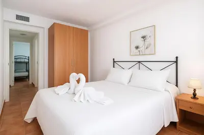 Cama o camas de una habitación en Apartamento en Marina Beach con vistas al mar