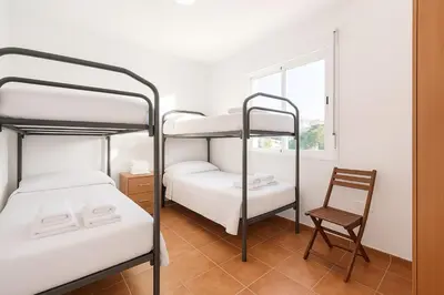 Cama o camas de una habitación en Apartamento en Marina Beach con vistas al mar