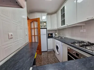 Una cocina o zona de cocina en Apartamento Las Gaviotas Aguadulce con Piscina y Jardin